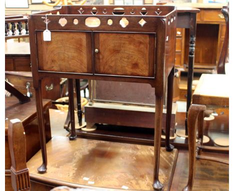 A George III mahogany night commode circa 1770 with pierced gallery.