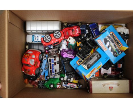 A collection of assorted play-worn, unboxed diecast vehicles to include: Matchbox and Corgi examples, together with two boxed