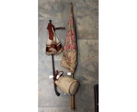 One mid 1860/70's parasol, slub silk and tobacco coloured satin edging and matching bow; a floral linen Edwardian parasol wit