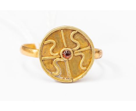 East Greek Hellenistic (4th to 1st Century BC) A Gold ring with plain band, oval shield shaped bezel with cross to the centre