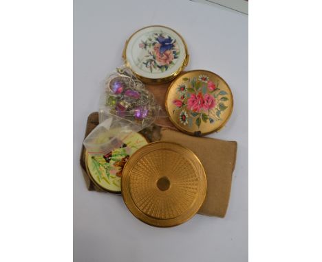 Five powder compact, to include Stratton, three with pouches, circa 1950's/60's along with a white metal and gold stone penda