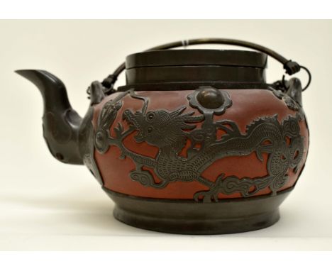 A Chinese terracotta and lead teapot, marks to base