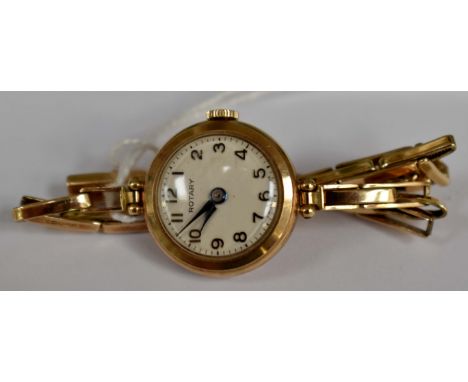 A 9ct gold ladies Rotary wristwatch, round dial, white dial, numbers, case approx 18mm, total gross weight approx 11.9gms