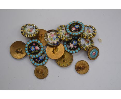 A collection of early 20th Century buttons, enamel and cut steel versions