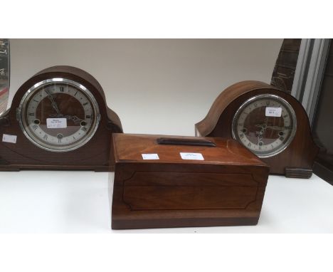 An early 20th century Walnut cased eight day mantle clock and a similar Oak cased eight day mantle clock, both with a Westmin