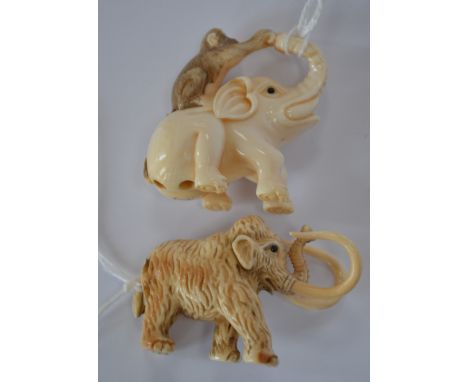 Two Japanese Netsuke ivory Mammoth and elephant with a monkey, signed