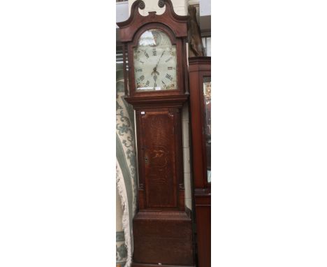  An early 19th Century oak and mahogany 30 hour longcase clock, the hood with a swan neck pediment, the glazed door enclosing