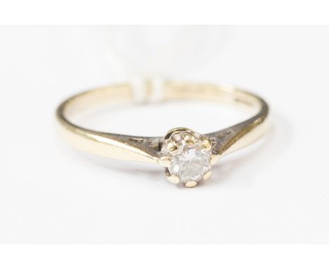 A 9ct white gold and diamond solitaire ring, set round brilliant cut diamond, hallmarked for 9 carat gold and stamped "25 PTS