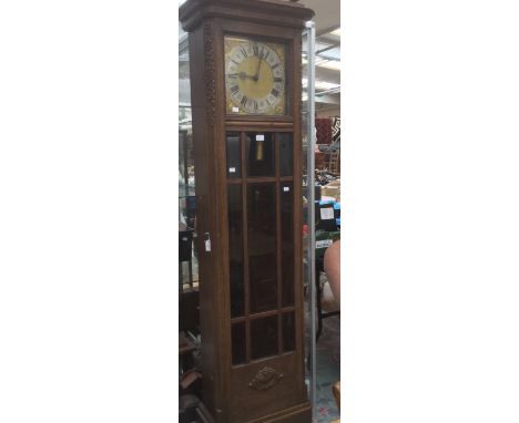 An early 20th Century eight day, oak longcase clock.