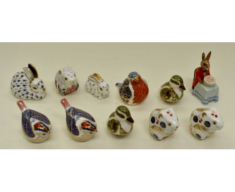 Collection of Royal Crown Derby paperweights, nine gold stoppers, along with a Royal Doulton Bunnykins