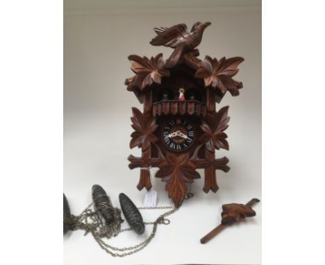 A Swiss made cuckoo clock, Loetscher, all complete, 20th Century