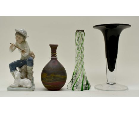 A 1905 Wrythen glass slender vase with traced green glass on the spiral, a modern hand made glass vase, a Nao porcelain figur