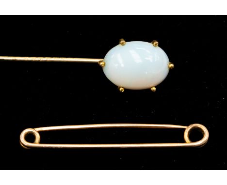 An Edwardian gilt metal synthetic opal set stick pin and an unmarked rose metal tie pin, weight approx 2.5 gms (2)