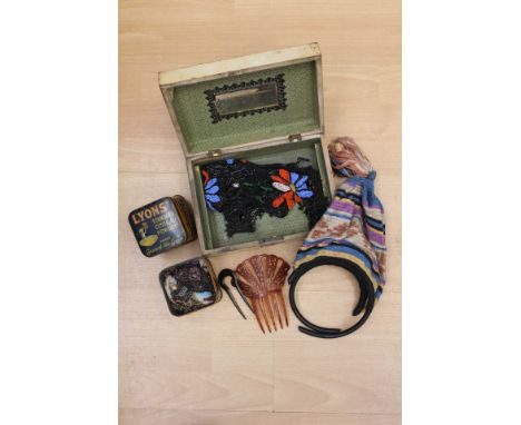 Beadwork items, 1920s and loose beads (bugle) in two Lyons custard tins, two mantilla combs and a crochet bag