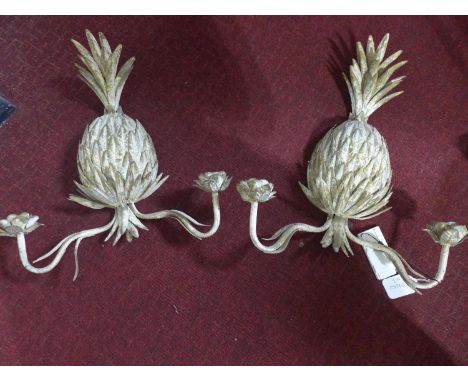 A pair of sheet metal 2 branch pineapple wall sconces, H.43 W.43cm, together with a contemporary glass and gilt metal pineapp