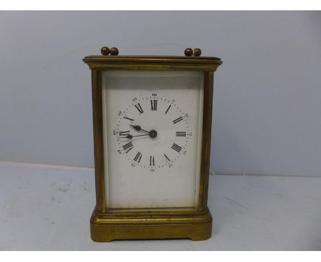 An early 20th century French brass carriage clock by Richard &amp; Cie, the white dial with Roman numerals and outer minute t