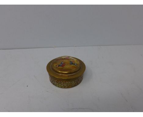 A Persian mother of pearl inlaid brass trinket box, hand-painted to the mother of pearl inlaid lid with polo players, H.2.5cm
