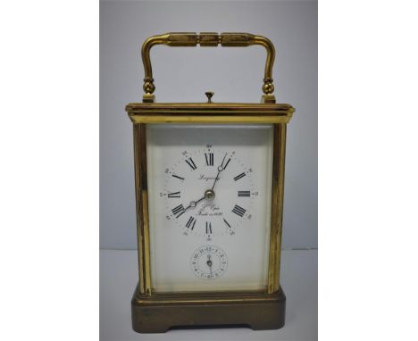 A French L'Epee Looping gilt brass carriage clock, with repeating button, white dial with Roman and Arabic numerals, subsidia