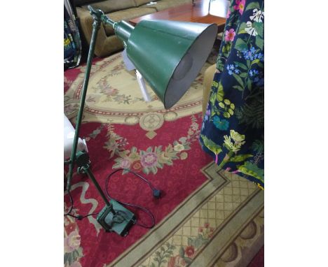 A vintage green metal anglepoise lamp 