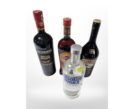Four bottles of alcohol to include Martini, Baileys, Cockburns port, and Absolut vodka.