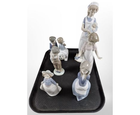 Six various Nao figures, tallest 34cm.