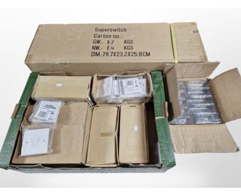 Two boxes of new interior light switches 