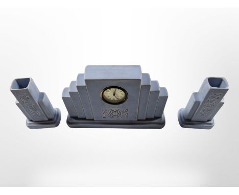 An Art Deco blue ceramic clock garniture set, clock 18 cm high 