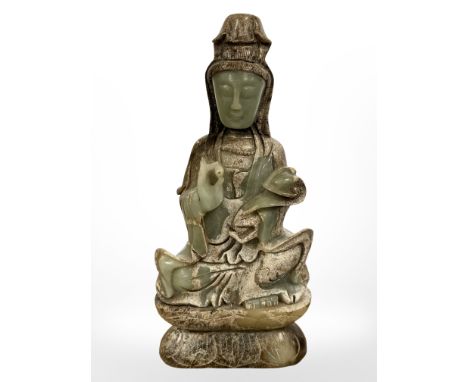 A Chinese carved jade figure of Guanyin, height 33cm