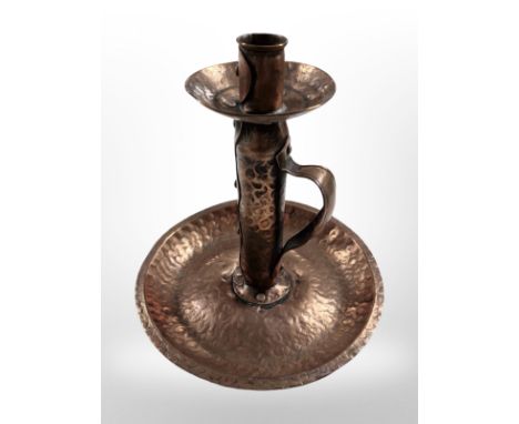A hammered copper on pewter chamber stick, height 18cm.