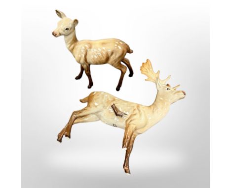 A Beswick Doe figure model 999A, height 15 cm, together with a Stag of the same manufacture. (2) CONDITION REPORT: Stag leg d
