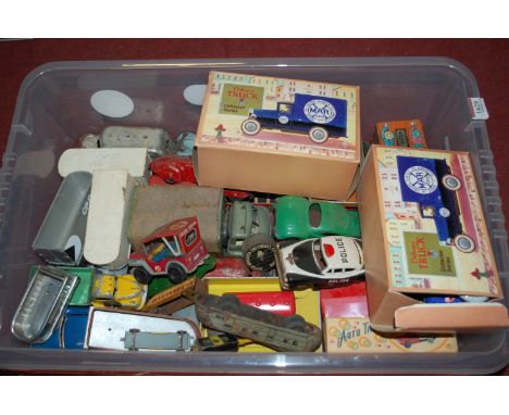 A box containing a quantity of mixed tinplate and diecast vehicles, to include Louis Marx, and a Louis Marx tinplate dolls ho