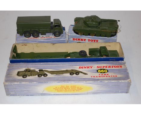 Three various boxed Dinky Toys military diecast models, to include No.660 tank transporter, No.651 Centurion tank, and No.662