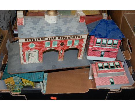 Two boxes containing a quantity of Louis Marx tinplate buildings and accessories to include farm house, signal boxes, etc