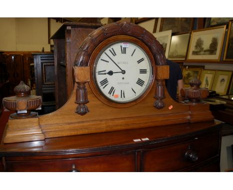 A large mid-Victorian mahogany mantel clock, having single fusee movement, the white enamel dial signed Bethell Thetford, hav