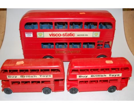 Three various plastic mixed scale London Transport double decker buses 