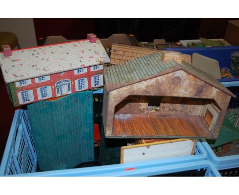 Two boxes containing a quantity of Louis Marx tinplate and plastic farmyard and civilian sets, to include farm barn, farmhous