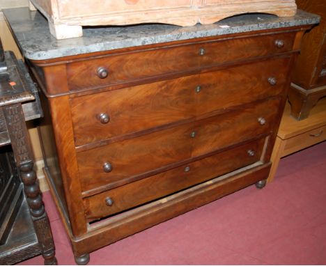 A 19th century French mahogany commode, having a grey marble top over four long drawers, on turned feet, w.115cm, d.55cm, h.9