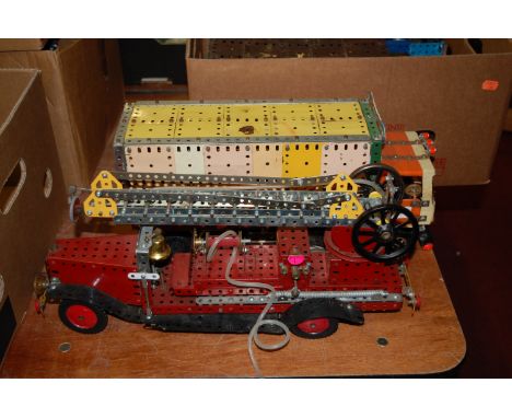 Two Meccano home built models to include a fire engine and a cargo lorry