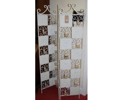 A contemporary white painted wrought metal three-fold garden screen, fitted with removable glass candle holders 
