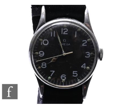 An Omega stainless steel Air Ministry manual wind wrist watch with Arabic numerals to a black circular dial, case diameter 34