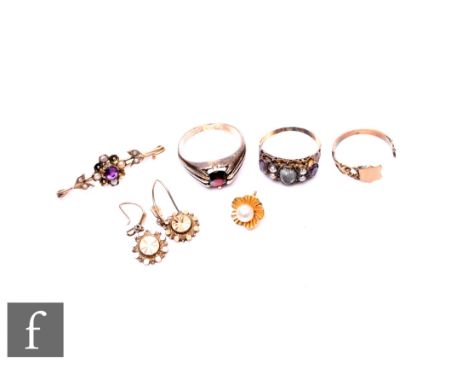 A small parcel lot of jewellery, to include a small 9ct gold seed pearl and purple paste stone bar brooch, a 19th Century 15c