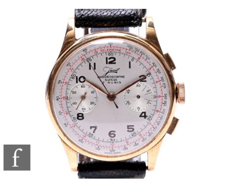 An 18ct gentleman's Jarvil Swiss chronograph manual wind wrist watch with Arabic numerals and twin subsidiary dials to a circ