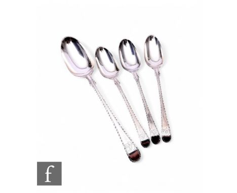 A set four Georgian old English feather edge pattern spoons, one table and three tea examples, total weight 3.70oz, London 17