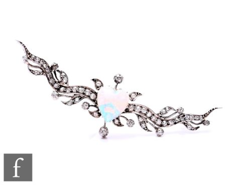 A white gold and silver fronted opal and diamond bar brooch, central heart shaped cut opal, length approximately 10mm, to an 