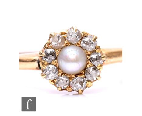 A early 20th Century 18ct pearl and diamond cluster ring, central pearl within a border of eight old cut diamonds, weight 2.5