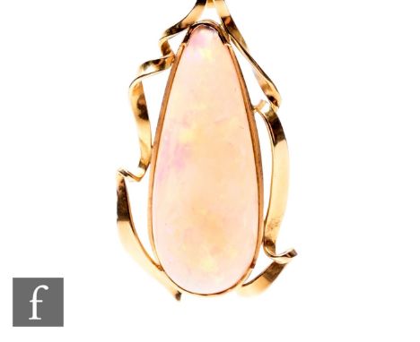 An 18ct single stone opal pendant, tear shaped stone, to a collar setting and pierced waved border, weight 10g, length of sto