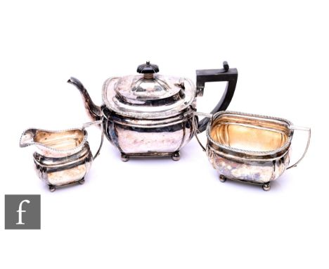 A hallmarked silver three piece bachelor's boat shaped, tea set, total weight 21.4oz, Birmingham 1903,&nbsp;Elkington &amp; C
