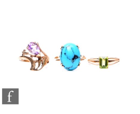 Three 9ct single stone set rings, turquoise, amethyst and peridot examples, total weight 7g. (3)