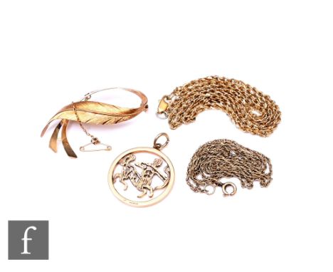 A 9ct abstract brooch with a 9ct zodiac pendant and two 9ct chains, total weight 21g. (4)