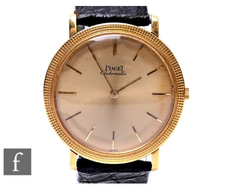 A gentleman's 18ct Piaget automatic wrist watch, gilt batons to a circular dial, case diameter 34mm, all to a black leather s